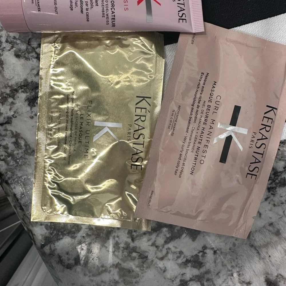Kérastase Hair Care Set with Striped Black and White Clutch Zip Bag